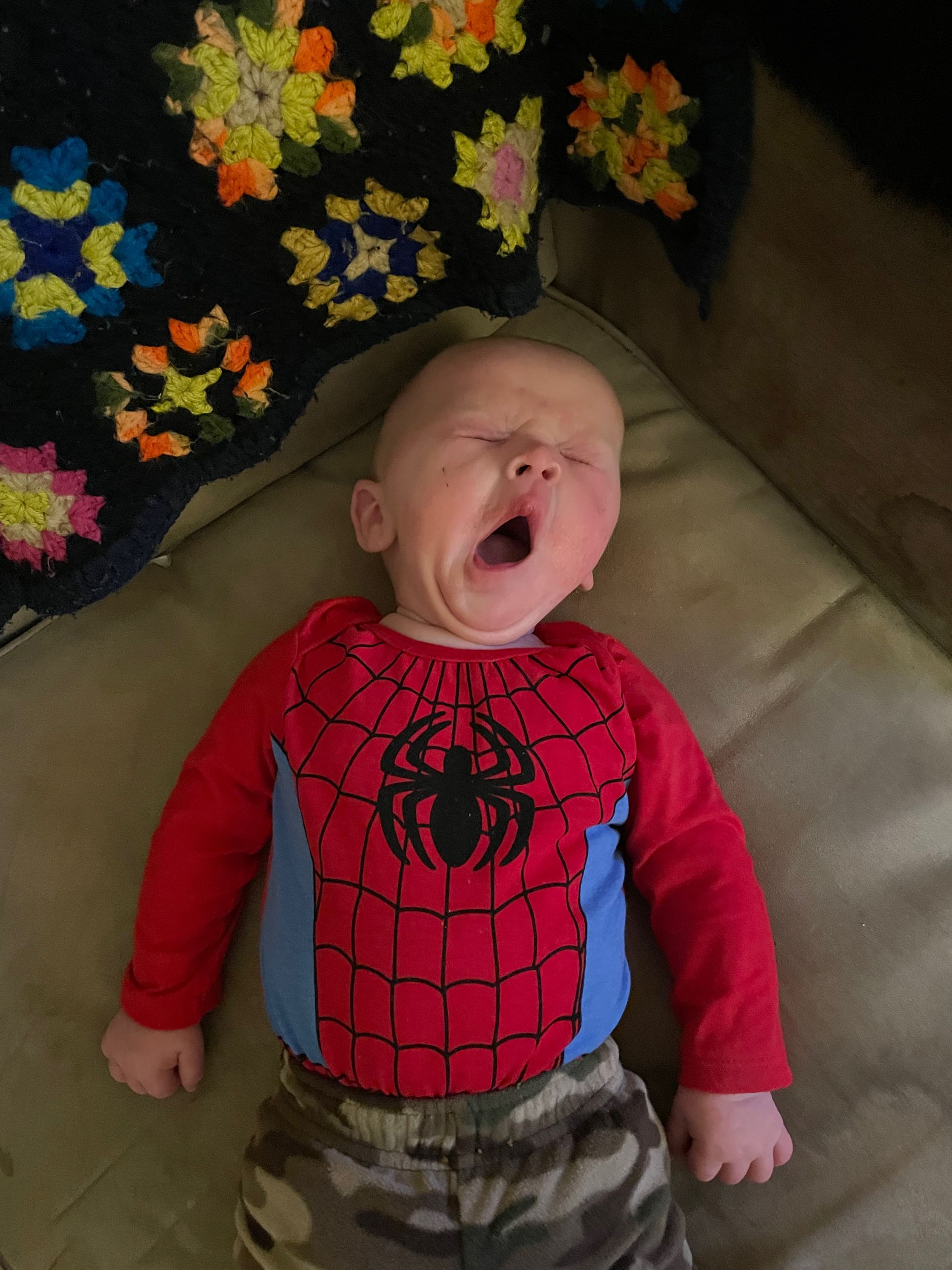 Photo of baby in a Spider-Man shirt